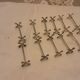 12 silver metal knife holders punched