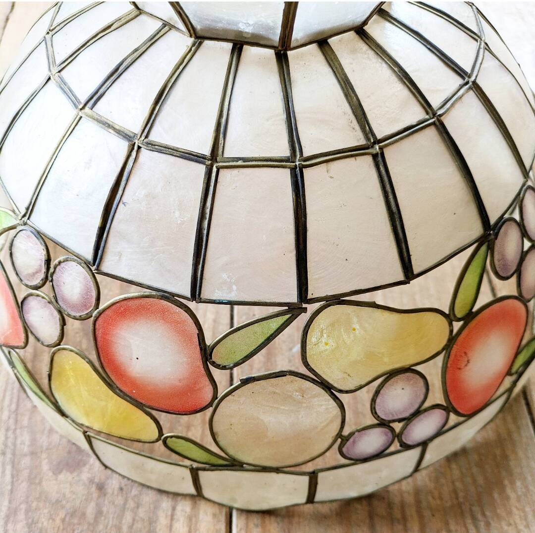 Vintage mother-of-pearl and brass pendant light.