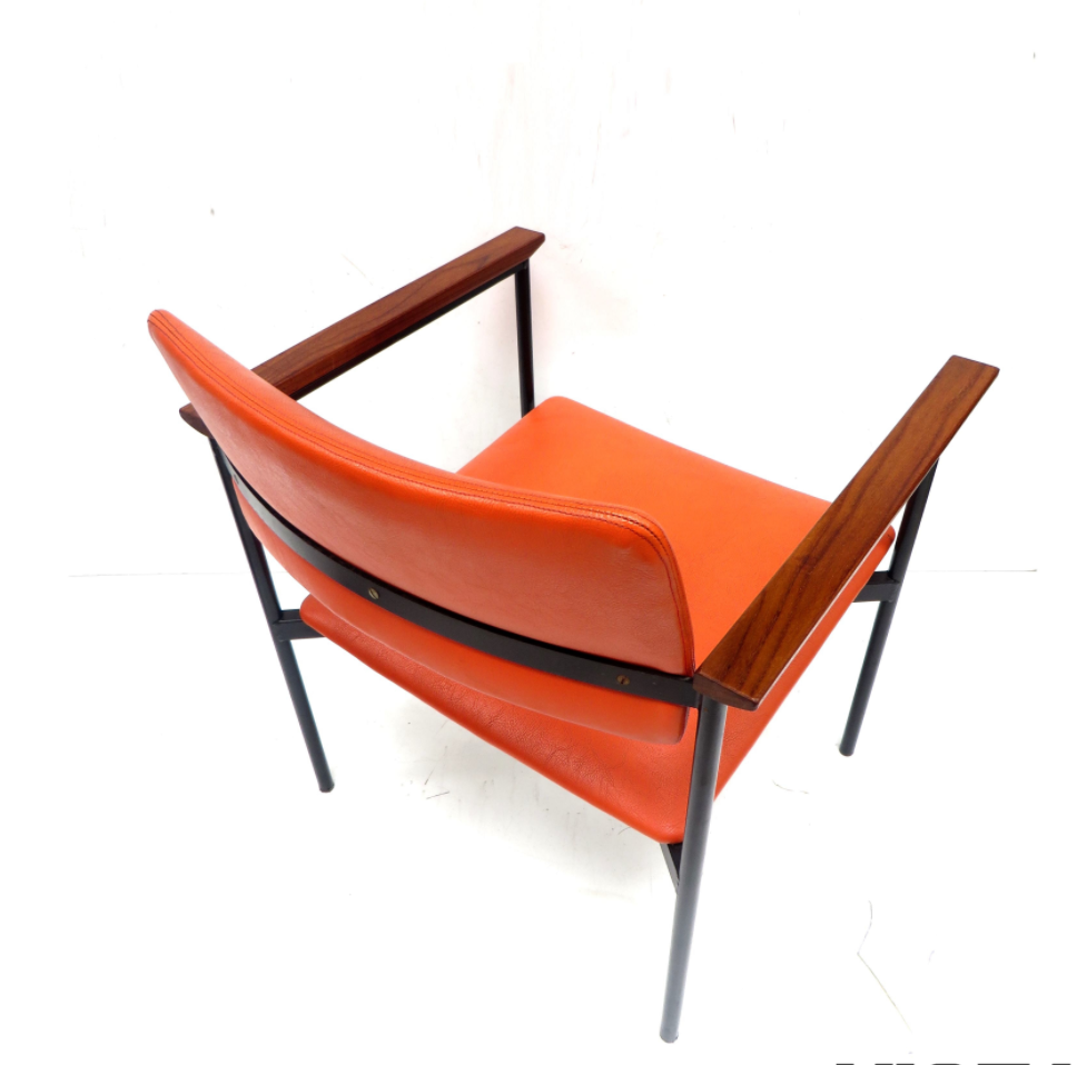 Orange Chair with structure in metal black and beautiful wooden armrests