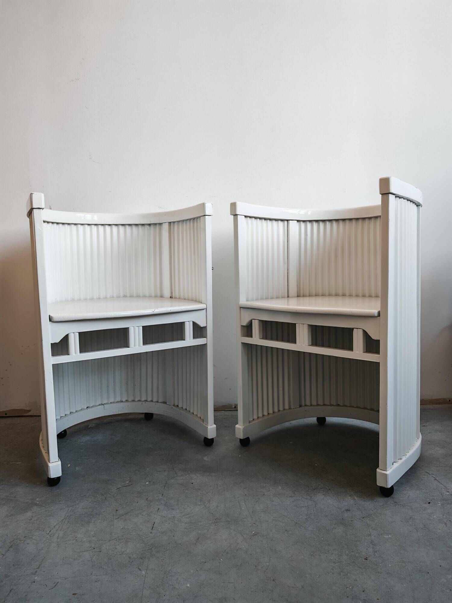 Pair of antique horseshoe accent chairs attributed to Hans Gunther Reinstein.