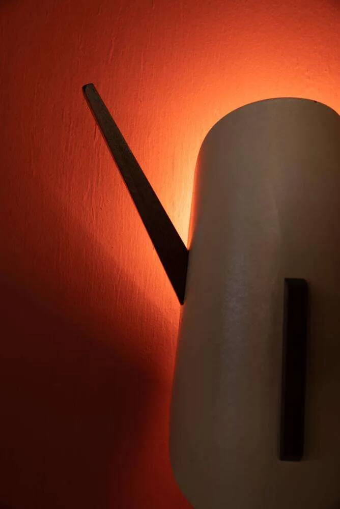 Vintage wall lamp from the 60s, teak and mid-century metal.