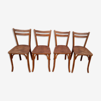 Serie de 4 chaises de bistrot signé Baumann