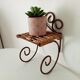 Antique wrought iron wall shelf