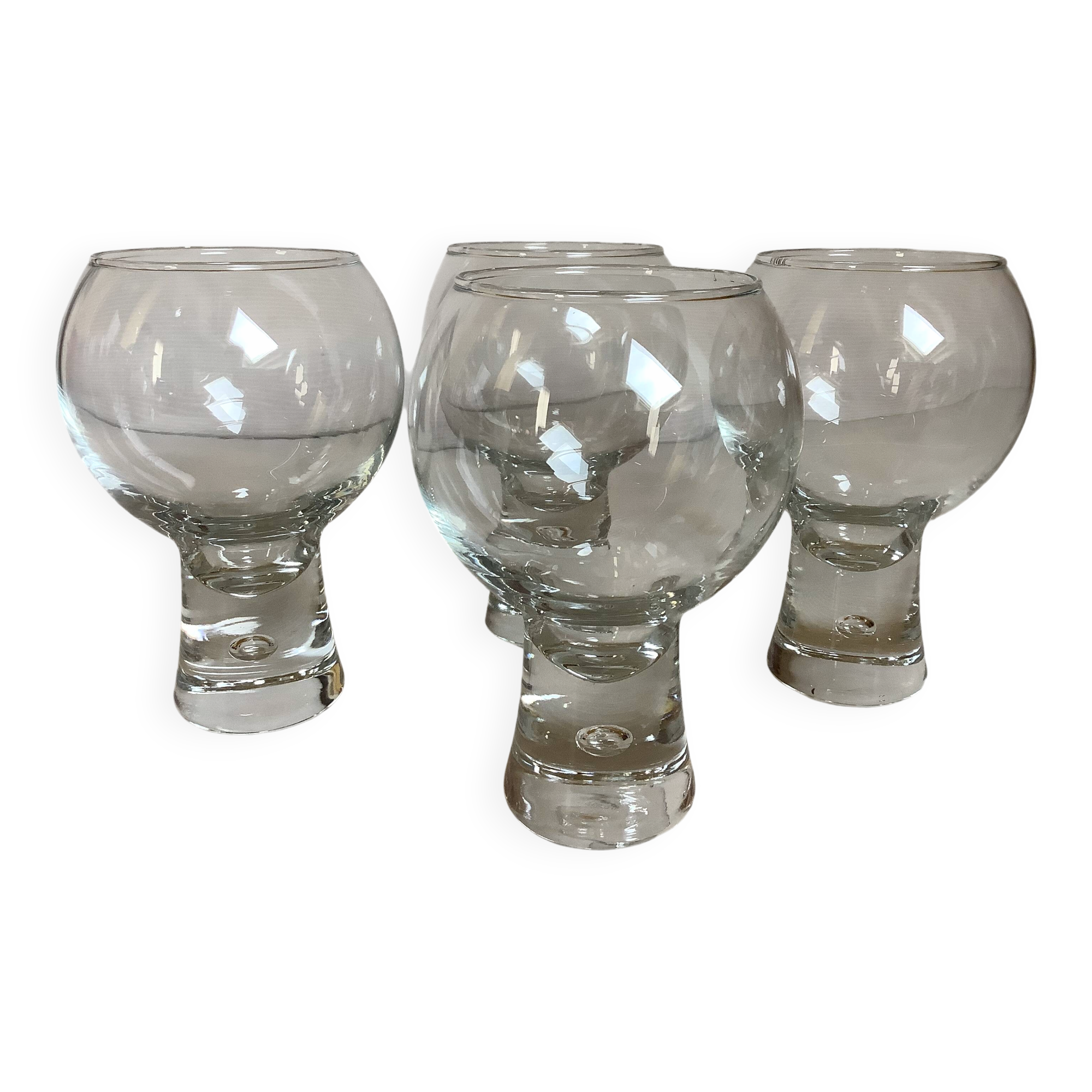 Four large bubble-style glasses by Kosta Boda.