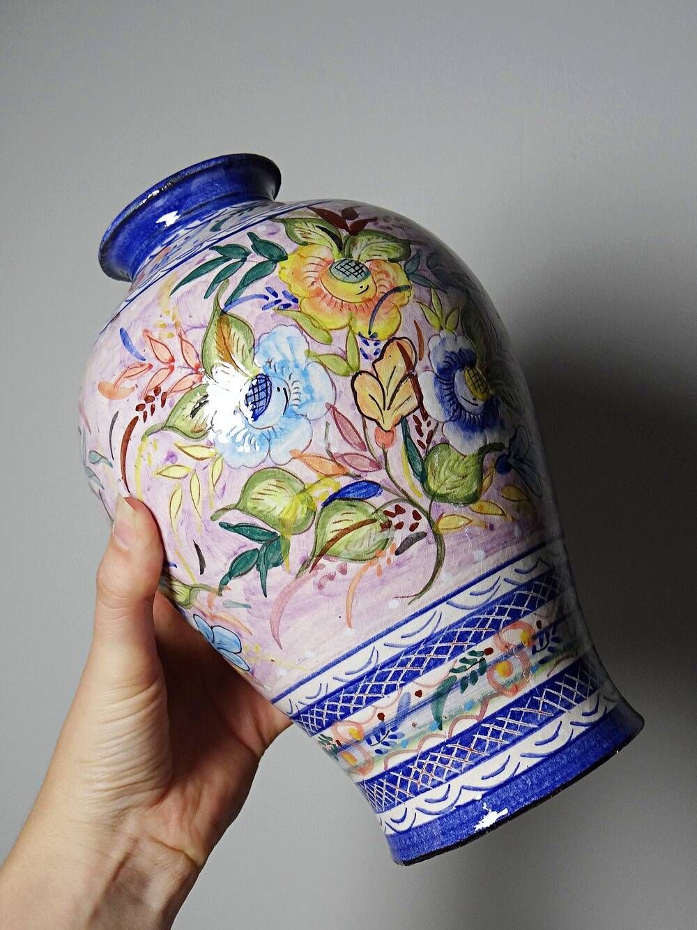 Vintage Portuguese vase in glazed terracotta with hand-painted floral decoration.
