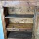 Antique rustic wardrobe in raw wood