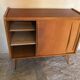 Vintage storage cabinet sliding doors and compass legs