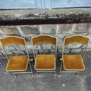 3 antique folding opera chairs in golden velvet and brass