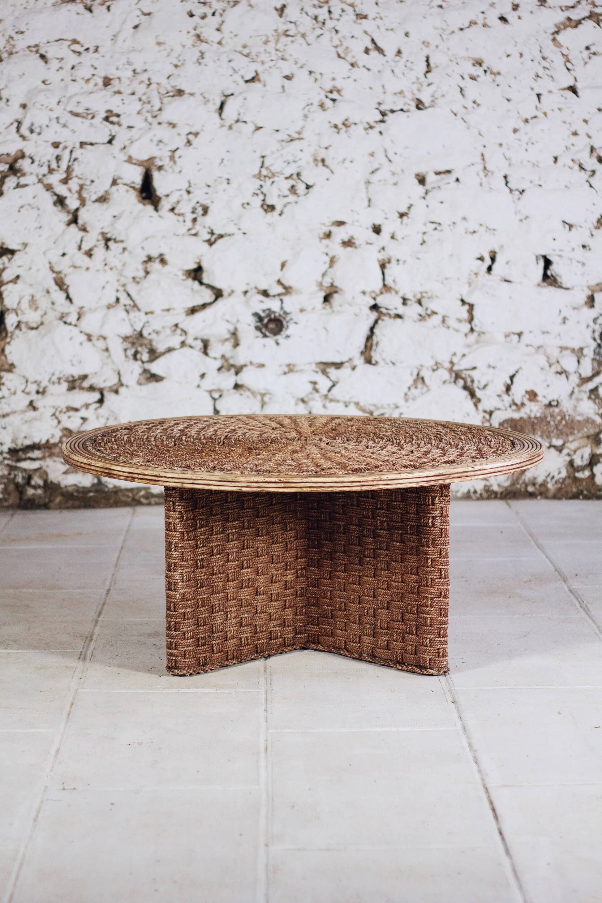 Round coffee table in braided cord and rattan, 1970.