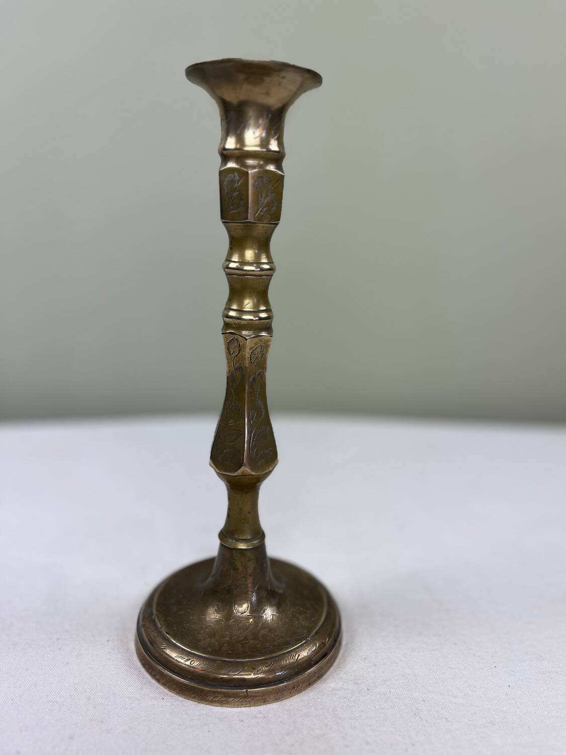 Engraved brass candle holder