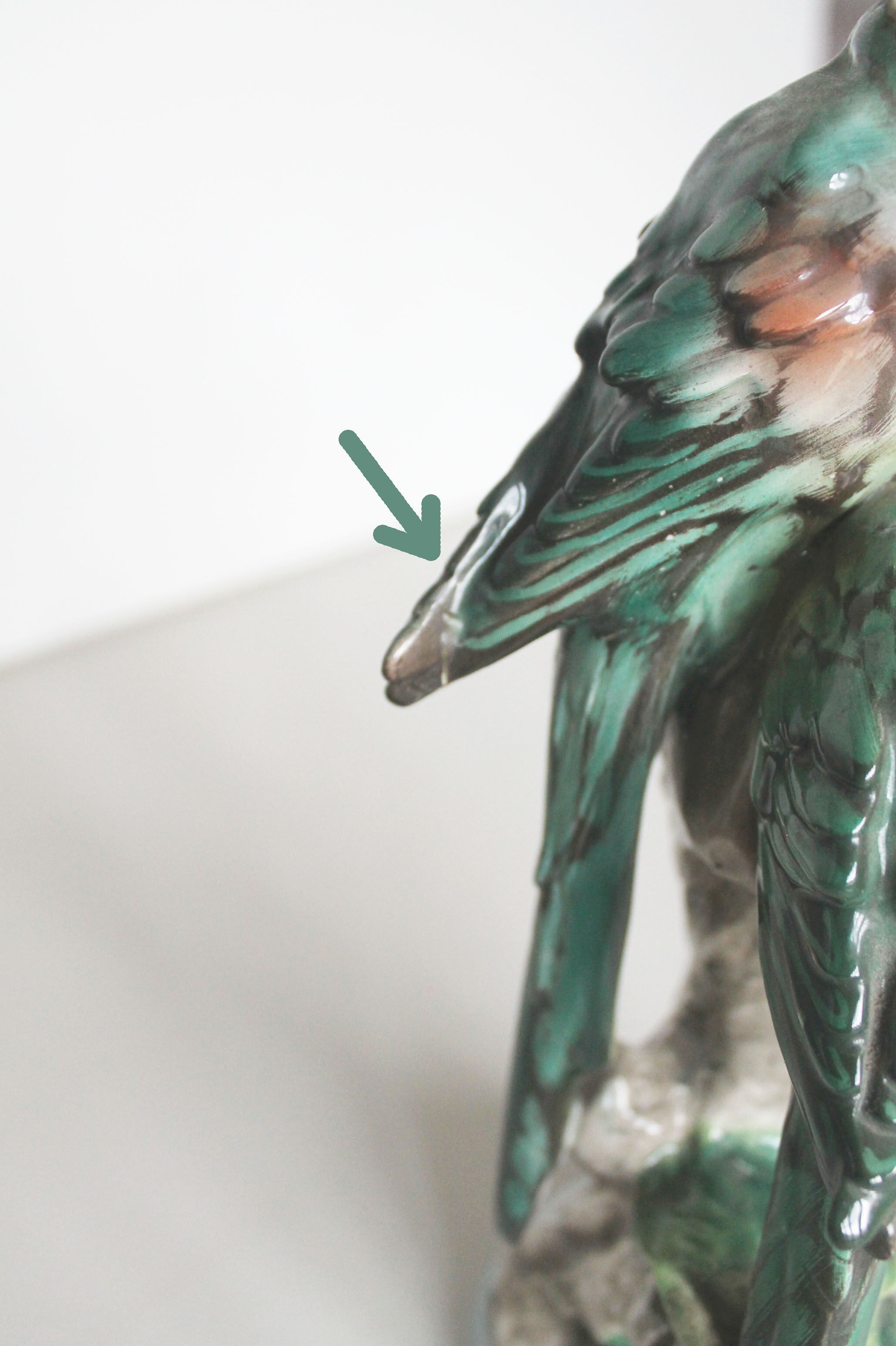 Couple of ceramic parakeets