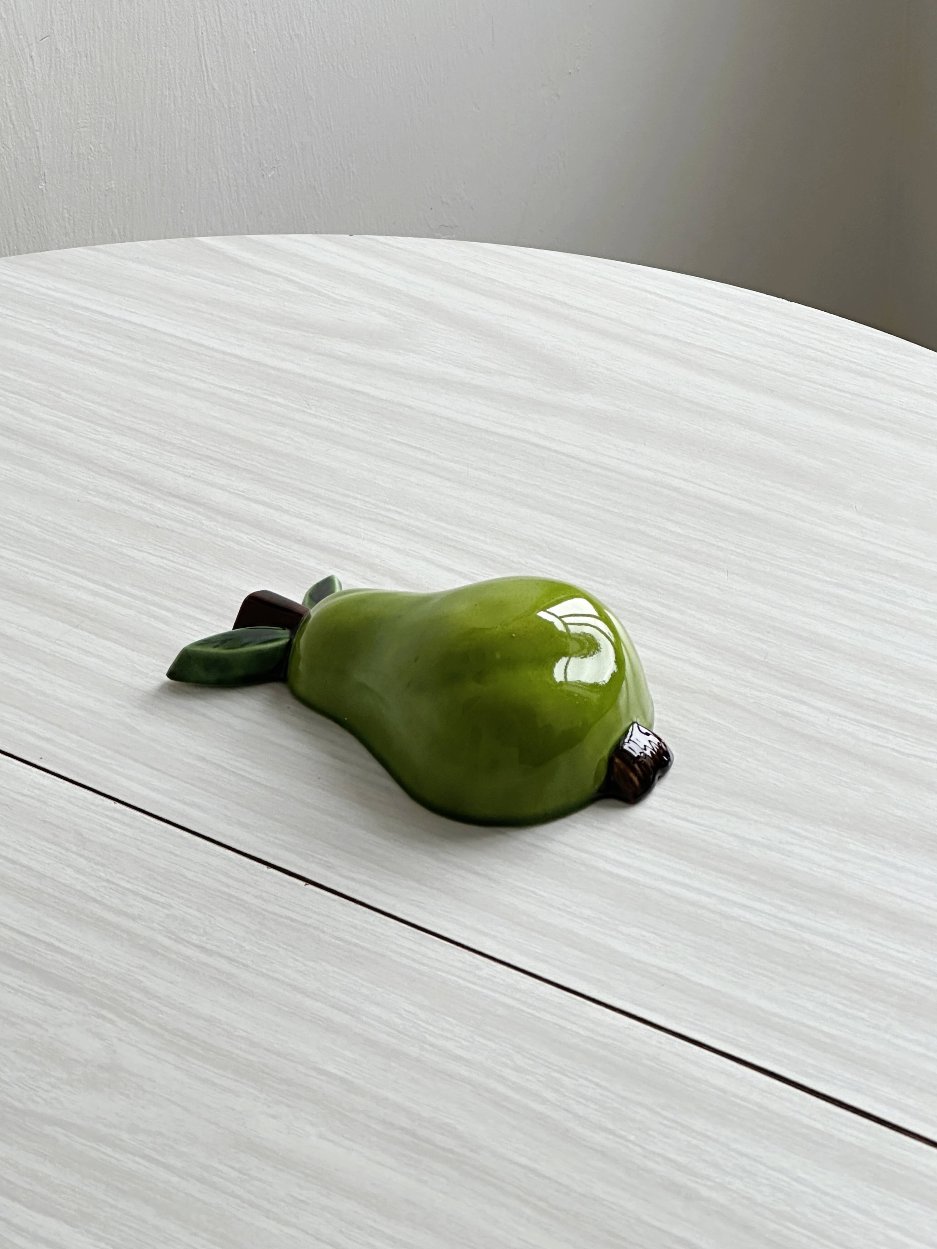 Pear wall ceramic.