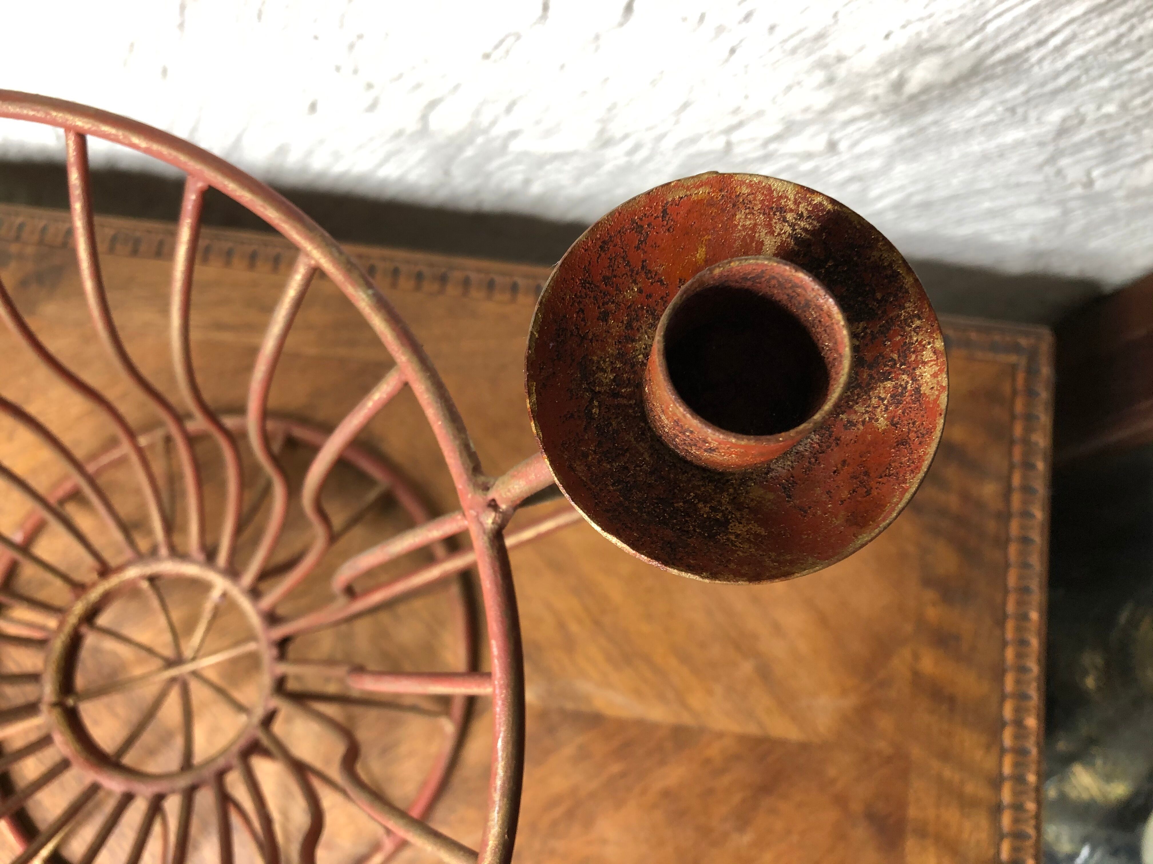 Metal basket with candlesticks