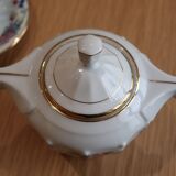 Coffee and tea service in Limoges porcelain with anemone flower pattern and gilding.