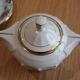 Coffee and tea service in Limoges porcelain with anemone flower pattern and gilding.