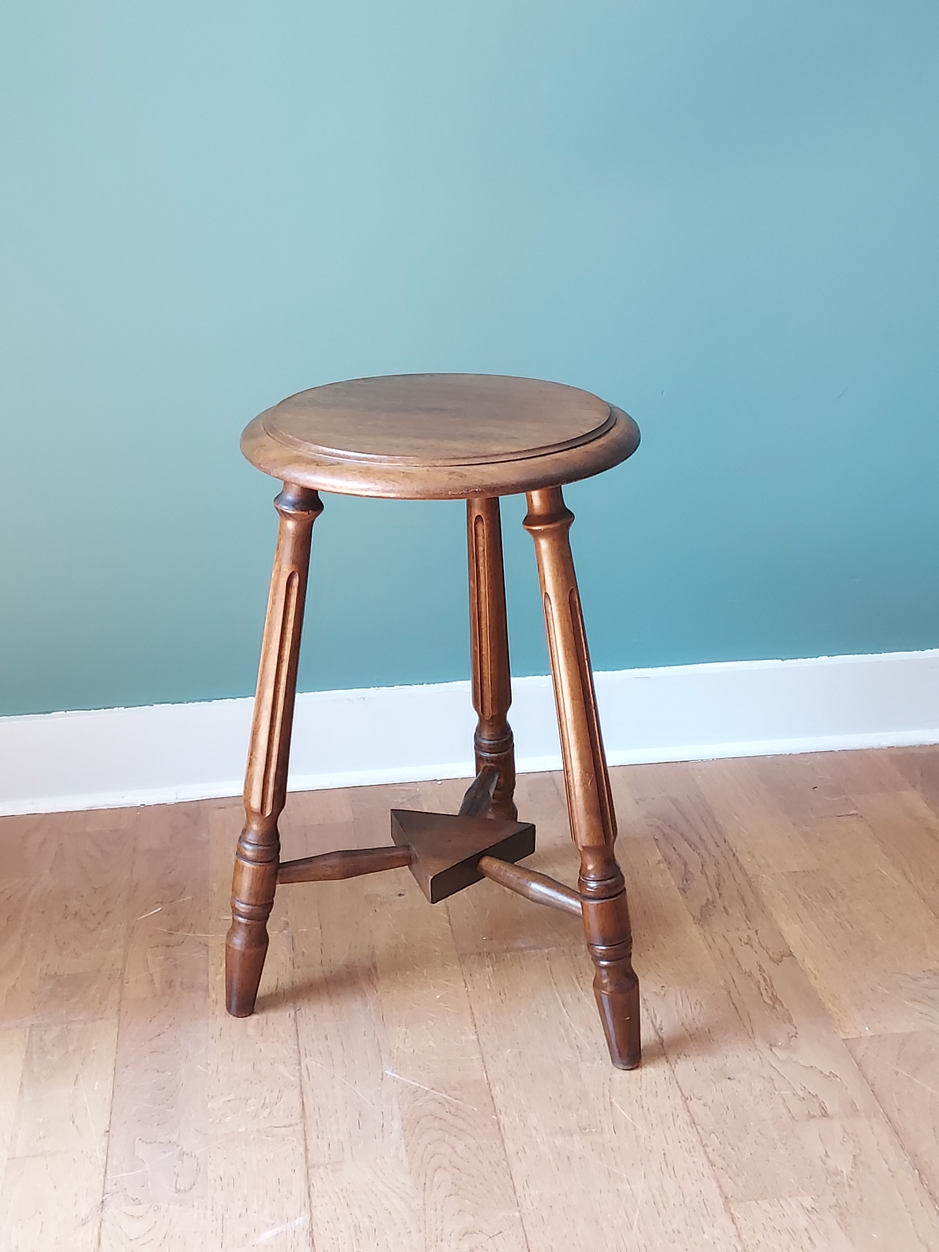 Carved tripod stool