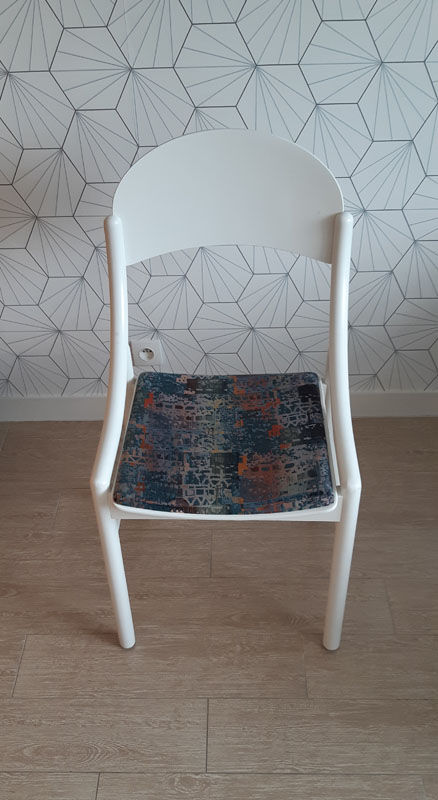 White Baumann chair.