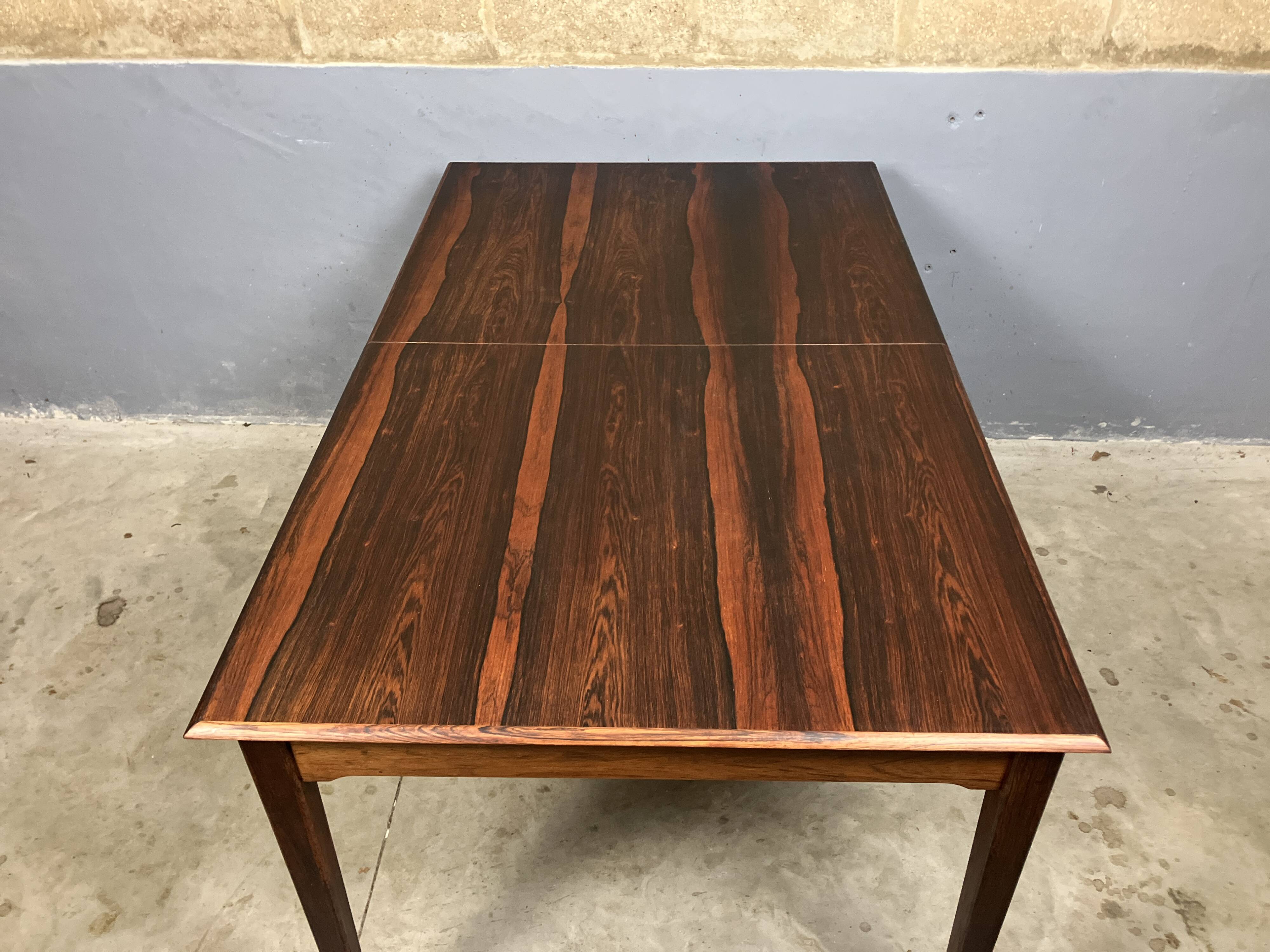 Mid-century rosewood extendable dining table