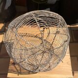 Old egg basket in metal shape round metal handle