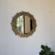 Brutalist round hammered gold metal mirror