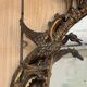 Large gilded wooden mirror, richly carved with winged dragons, 19th century
