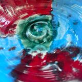 Multicolored artist's pocket emptier