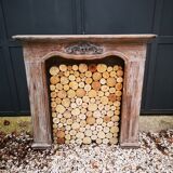 Patinated wooden fireplace
