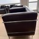pair of authentic LC2 armchairs
