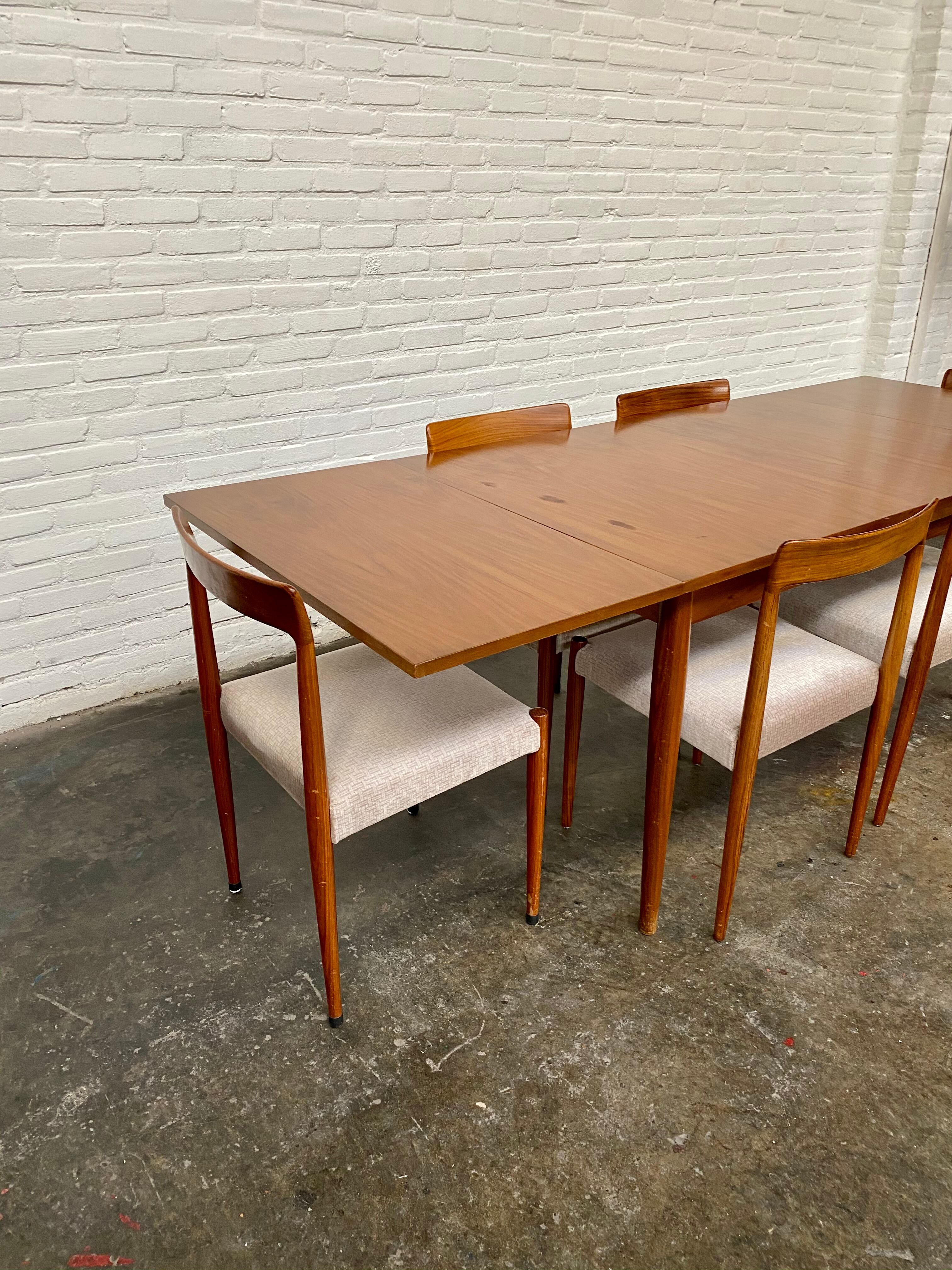 Vintage teak square extendable  dining table designed and manufactured by lübke,  1960s