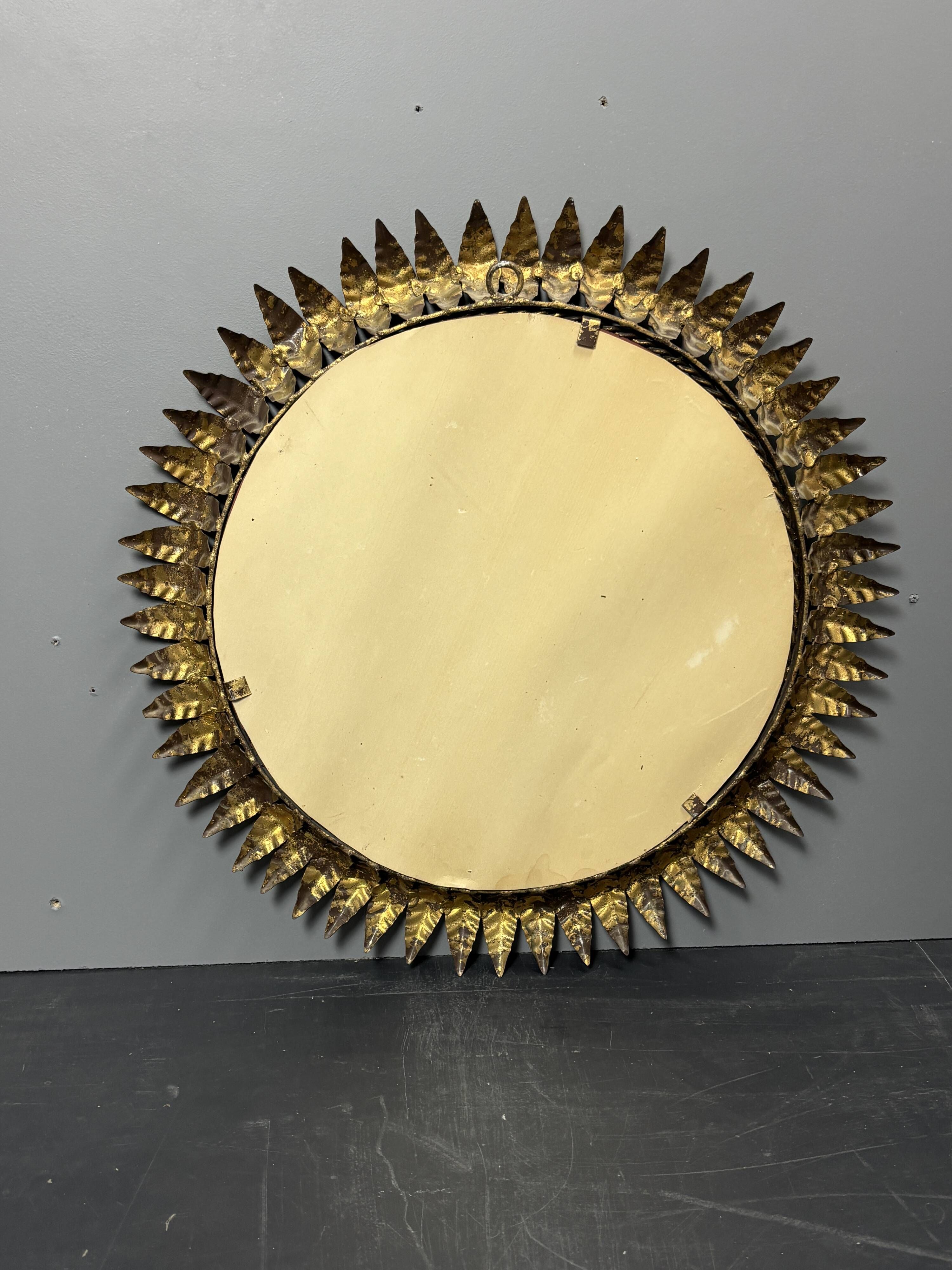 Midcentury bohemian Hollywood Regency Spanish gilt metal sun mirror, 1960s