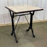 Bistro table with cast iron base - modern design