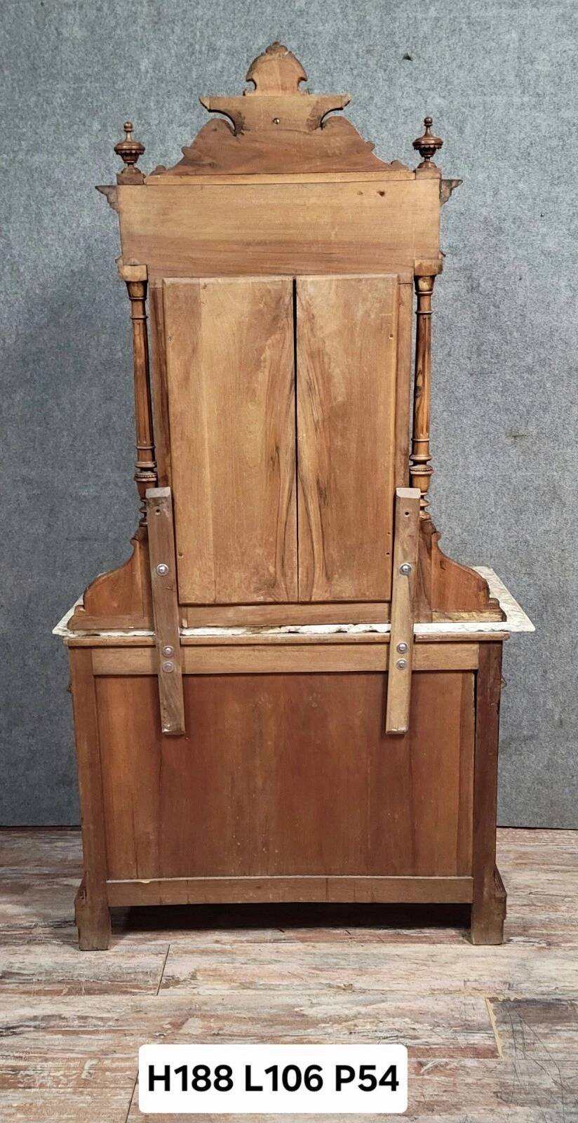 Buffet with mirror in Renaissance style, entirely made of solid walnut.