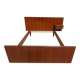Vintage bed in teak with integrated bedside table.