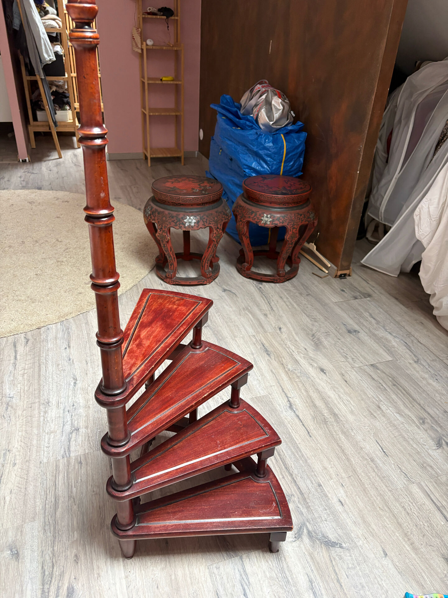 Library spiral staircase with 4 steps. Mahogany style wood.