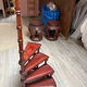 Library spiral staircase with 4 steps. Mahogany style wood.