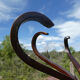 Baumann vintage swivel parrot coat holder of the 60s