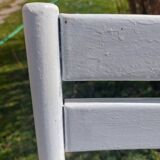 pair of white metal chairs, Tolix style