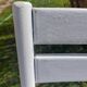 pair of white metal chairs, Tolix style