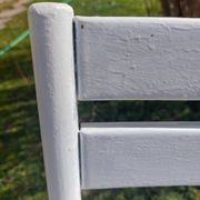 pair of white metal chairs, Tolix style