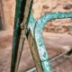 Vintage French bistro table in riveted iron – folding (1920s)