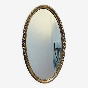 Large gold oval wall mirror