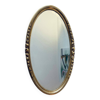 Large gold oval wall mirror