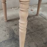 Round table with two raw cherry wood extensions