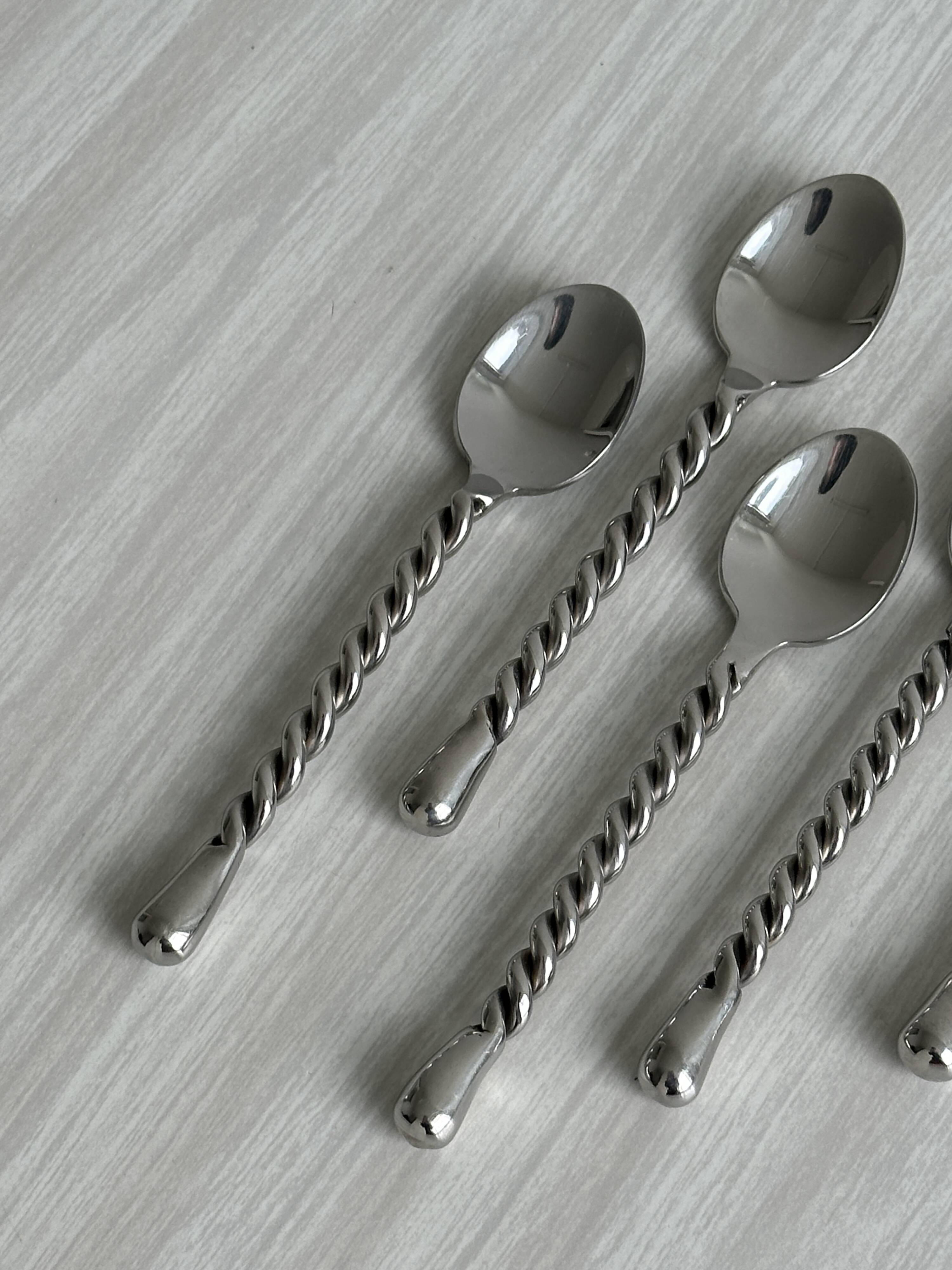 5 small twisted silver metal teaspoons