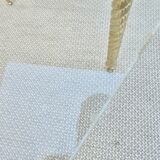 End of sofa, glass and twisted legs in gilded metal