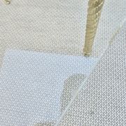 End of sofa, glass and twisted legs in gilded metal