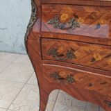 Louis XV curved chest of drawers in rosewood marquetry