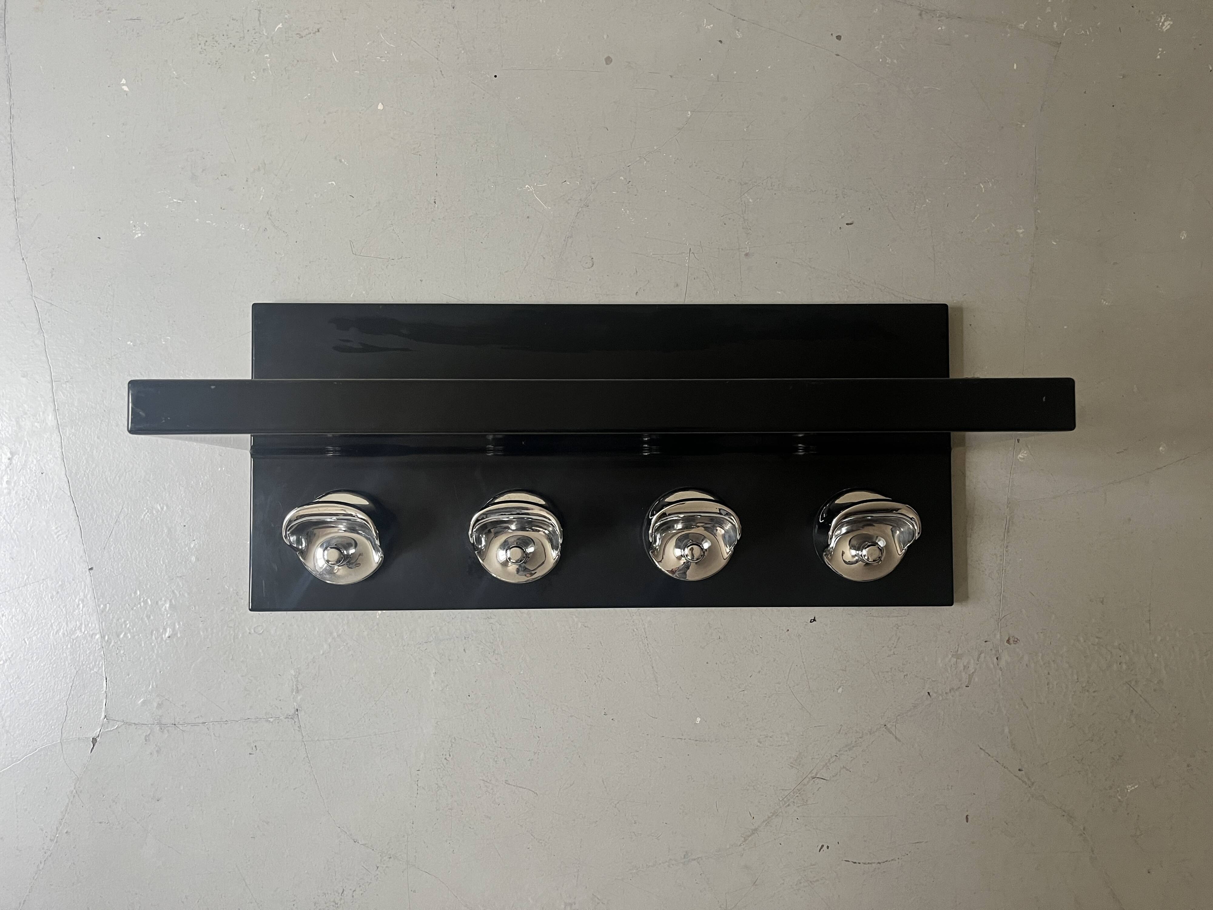 Large black magazine rack by Giotto Stoppino for Kartell, Italy 1970.