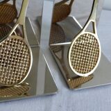 Pair of bookends, tennis racket.