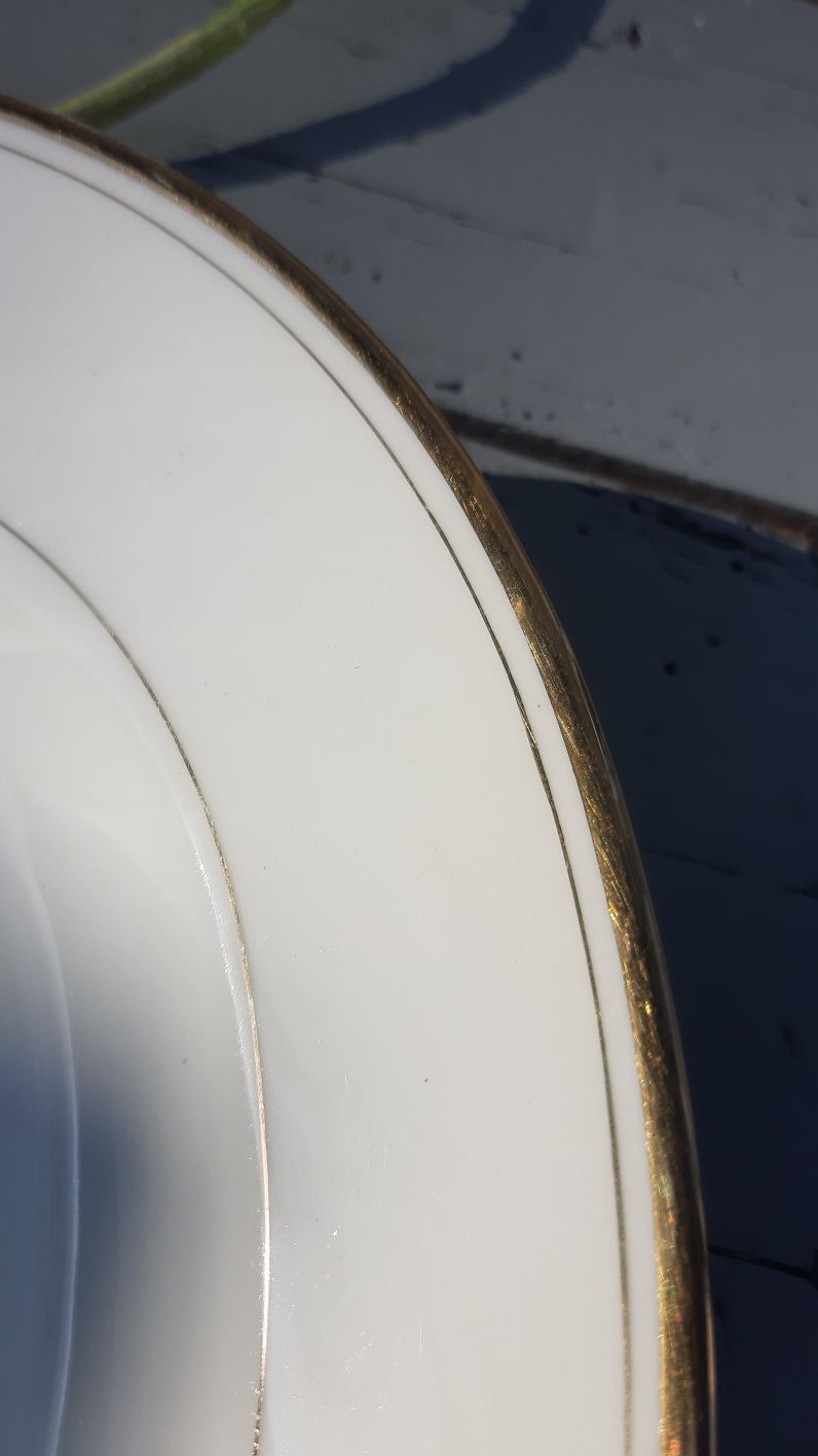 former oval white and gold Limoges porcelain dish